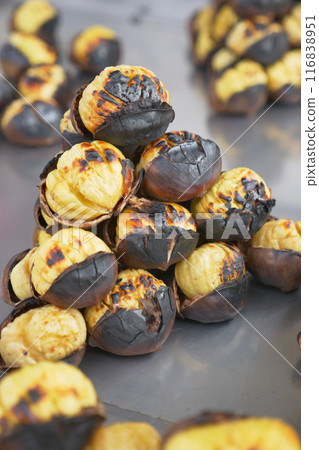 traditional Istanbul street food grilled chestnuts in a row traditional Istanbul street food grilled chestnuts in a row 116838951