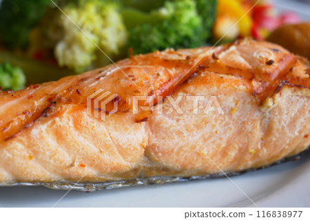 grill salmon served with fresh vegetables on a plate grill salmon served with fresh vegetables on a plate 116838977