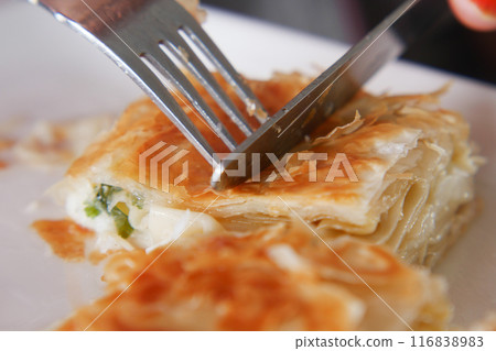 Traditional Turkish Cuisine Pastries borek on a plate Traditional Turkish Cuisine Pastries borek on a plate 116838983