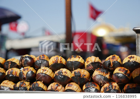 traditional Istanbul street food grilled chestnuts in a row traditional Istanbul street food grilled chestnuts in a row 116838995