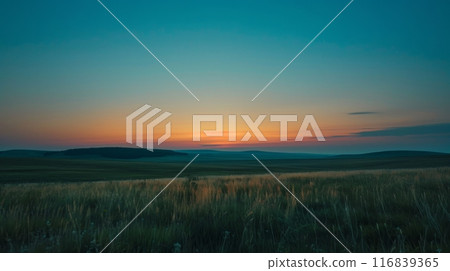 Sunset Over Serene Rolling Fields Landscape 116839365