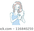A woman drying her hair with a towel 116840250
