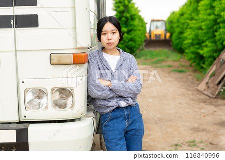 Woman near truck Woman near truck 116840996