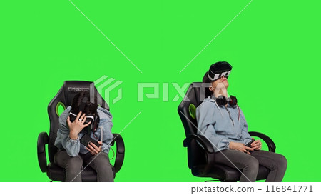 Woman feeling furious and disappointed with losing mobile gaming competition, playing tournament with smartphone and virtual reality headset. Displeased gamer sad after lost game. Camera B. 116841771