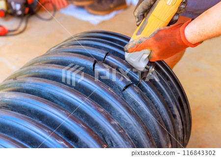 To connect two pipes, hole must be cut in black plastic polypropylene sanitary pipe 116843302