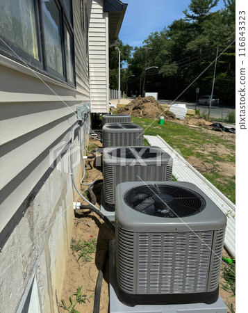 Construction new house has resulted in installation an air conditioners outside to serve needs of residents. Construction new house has resulted in installation an air conditioners outside to serve needs of residents. 116843323