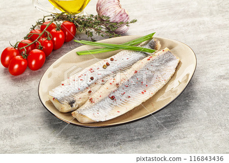 Marinated herring fillet with green onion Marinated herring fillet with green onion 116843436