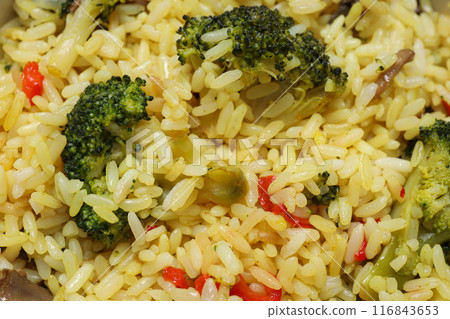 Pilaf, spices, vegetables and glasses of water on white background, top view Pilaf, spices, vegetables and glasses of water on white background, top view 116843653