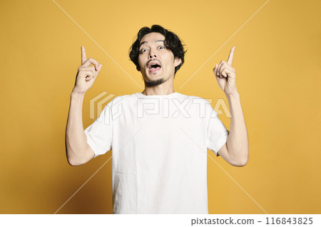 A man pointing with a colored background A man pointing with a colored background 116843825
