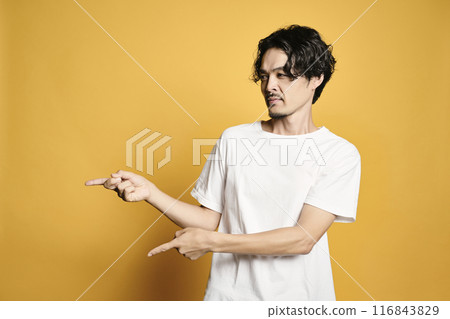 A man pointing with a colored background A man pointing with a colored background 116843829
