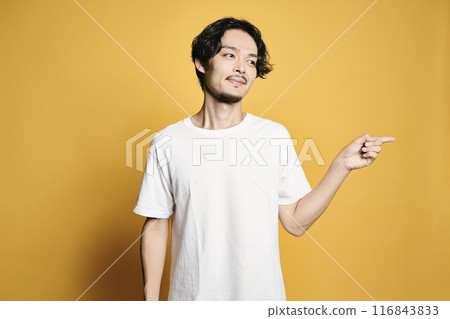A man pointing with a colored background A man pointing with a colored background 116843833