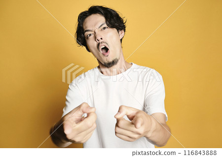 A man posing with a colored bag 116843888