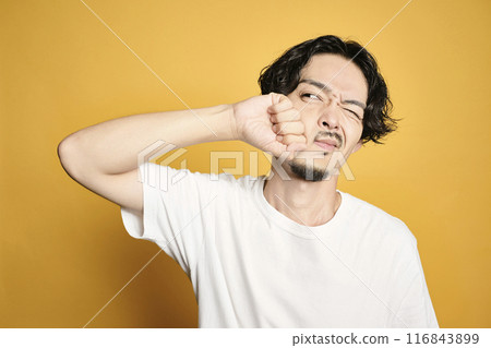 A man posing with a colored bag A man posing with a colored bag 116843899