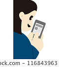 A woman from behind operating a smartphone with a smile 116843963