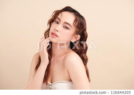 Beautiful young asian woman with clean fresh skin on beige background, Face care, Facial treatment, Cosmetology, beauty and spa, Asian women portrait. 116844205