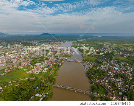 Cotabato City with river and bridge. Mindanao, Philippines. Cityscape. Cotabato City with river and bridge. Mindanao, Philippines. Cityscape. 116846455