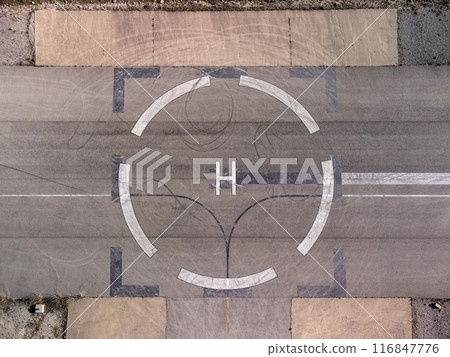 Helicopter landing symbol on a helipad 116847776