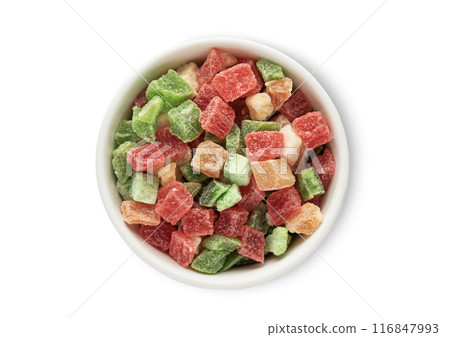 Bowl with dried sweet colorful fruit bites isolated on white background. Bowl with dried sweet colorful fruit bites isolated on white background. 116847993