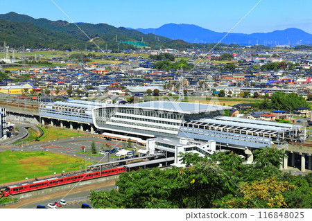[Saga Prefecture] Shin-Tosu Station and the Huis Ten Bosch Express train on a clear day (Asahiyama Park) 116848025