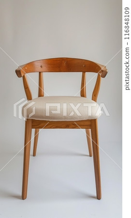 Wooden Chair with a White Cushion 116848109