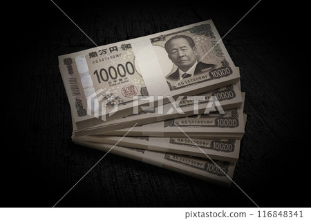 Japan's new banknotes. Negative image of a bundle of 5 million yen bills Japan's new banknotes. Negative image of a bundle of 5 million yen bills 116848341