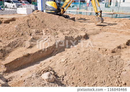 Image of a new house: Civil engineering work using heavy machinery to excavate the ground on the site 116848466