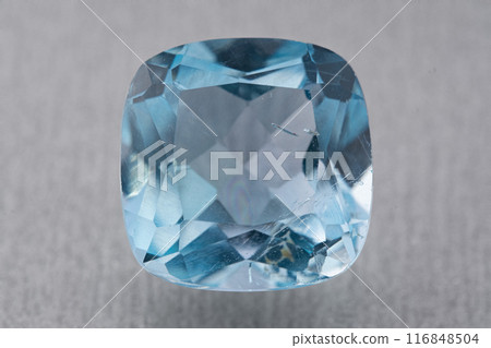 natural blue topaz gem on the isolated white background natural blue topaz gem on the isolated white background 116848504