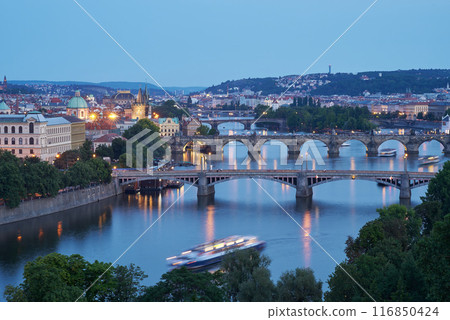 Aerial cityscape evening view of Prague, capital of Czech Republic, view from Letna park Aerial cityscape evening view of Prague, capital of Czech Republic, view from Letna park 116850424