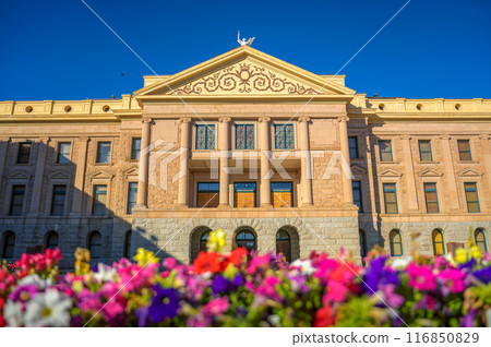 Arizona State Capitol in Phoenix, AZ, with colorful flowers in the foreground Arizona State Capitol in Phoenix, AZ, with colorful flowers in the foreground 116850829
