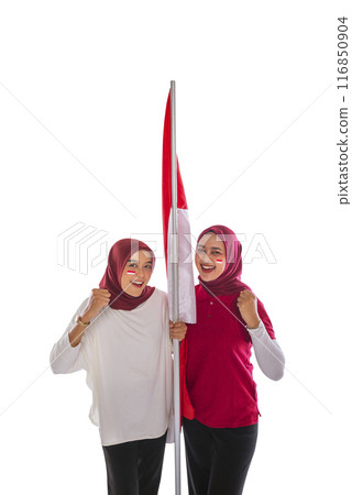 Portrait of two women with excited expressions holding Indonesian flags together 116850904