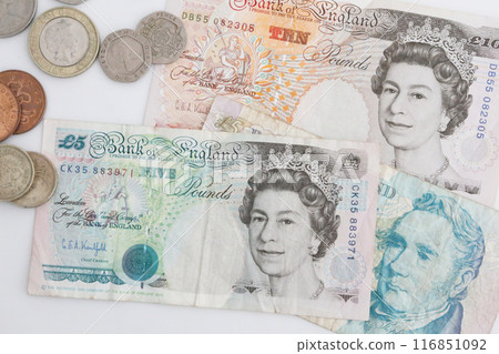 Photographed on a white background. A little old world money series. British pound. 116851092