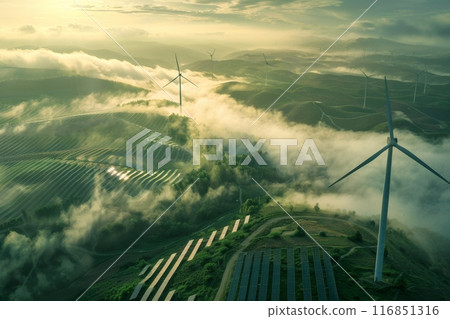 Wind turbines and solar panels providing renewable energy in a green valley 116851316