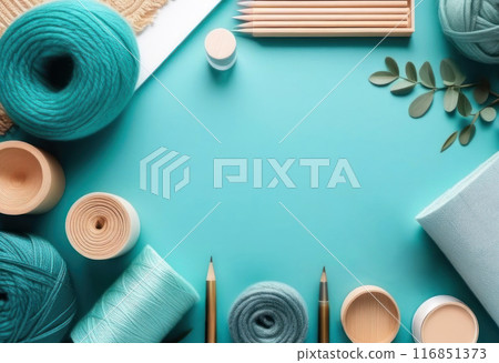 Dive into creativity with this beautifully arranged flat lay of vibrant yarn, art supplies 116851373