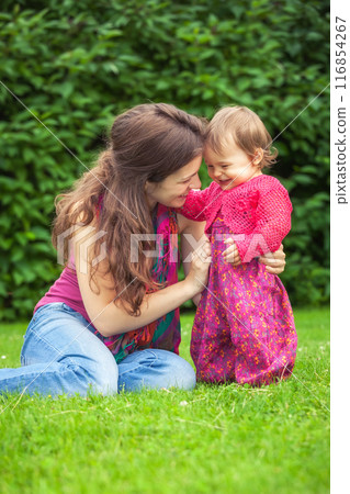 Mother with baby in the park Mother with baby in the park 116854267