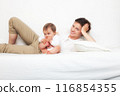 Mother playing with baby on white 116854355