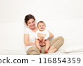 Mother playing with baby on white 116854359