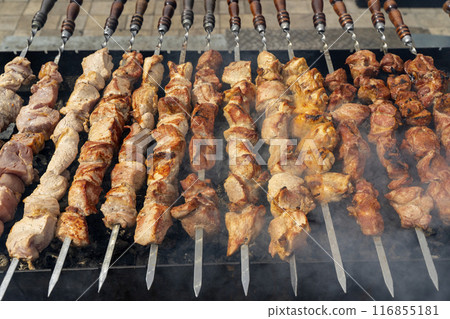 Kebab skewer meat dish. BBQ meat on grill.  116855181