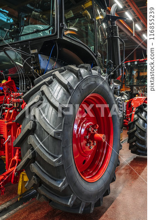 Tractor industry manufacture. New tractors on factory line. Production of agricultural machinery 116855239