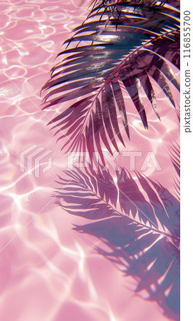 A Palm Tree Leaf Is Casting A Shadow On A Pink Beach 116855700