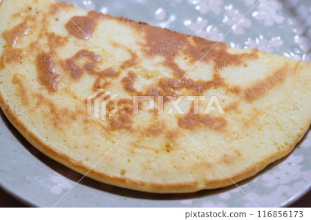 Pancakes that are unevenly cooked Pancakes that are unevenly cooked 116856173