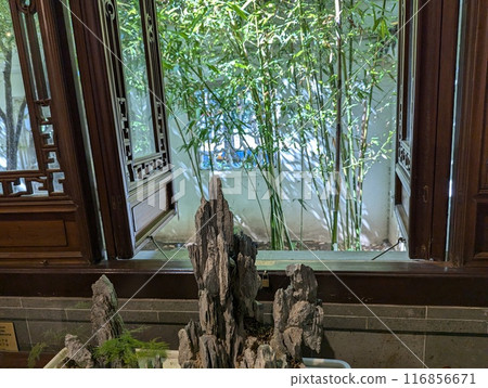 Portland, Oregon, USA - 07.10.2024: The famous Chinese Lan Su Garden. Interior of a tea house Portland, Oregon, USA - 07.10.2024: The famous Chinese Lan Su Garden. Interior of a tea house 116856671