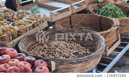 Snails for sale in a Sicilian market Snails for sale in a Sicilian market 116857260