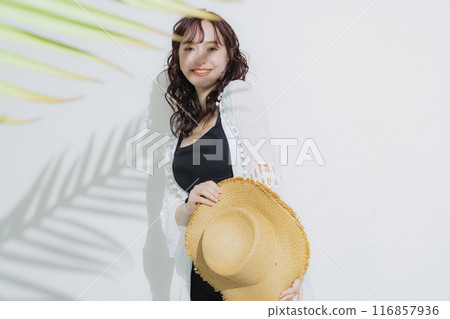 Young woman at summer resort Young woman at summer resort 116857936