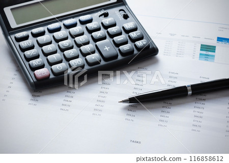 Budget concept with calculator on desk 116858612