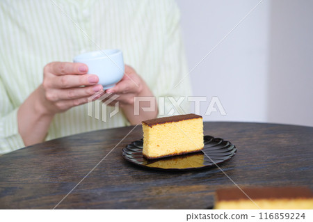 Middle-aged woman having fun with friends Middle-aged woman having fun with friends 116859224