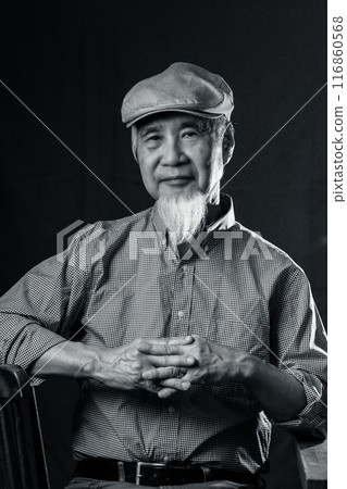 Senior man in his 60s or 70s with a white beard enjoying senior life Senior man in his 60s or 70s with a white beard enjoying senior life 116860568