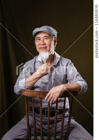 Senior man in his 60s or 70s with a white beard enjoying senior life Senior man in his 60s or 70s with a white beard enjoying senior life 116860636