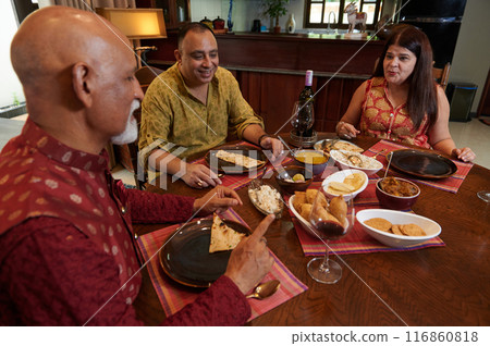 Friends Having Dinner At Home 116860818