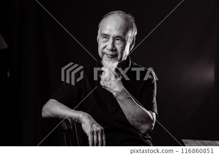 Senior man in his 60s or 70s with a white beard enjoying senior life Senior man in his 60s or 70s with a white beard enjoying senior life 116860851