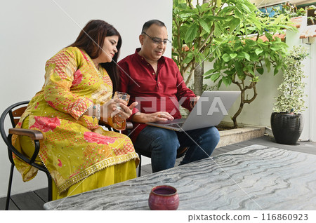 Mature Indian Couple Using Laptop 116860923